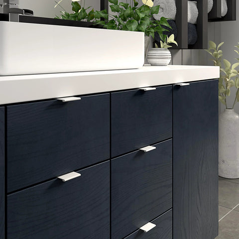 Lincoln Collection 1 5/16-Inch Center-To-Center White Modern Cabinet And Drawer Edge Pull Handle installed in a kitchen cabinet