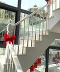 White Aluminum Railing Posts 37.4 Inch Deck Spindles 100 Pack With Adjustable Connectors And Shoe Base 270 Degree Angle Changeable No Sweat Setup Guardrail Uprights For Stairs installed in modern staircase with decorative elements.