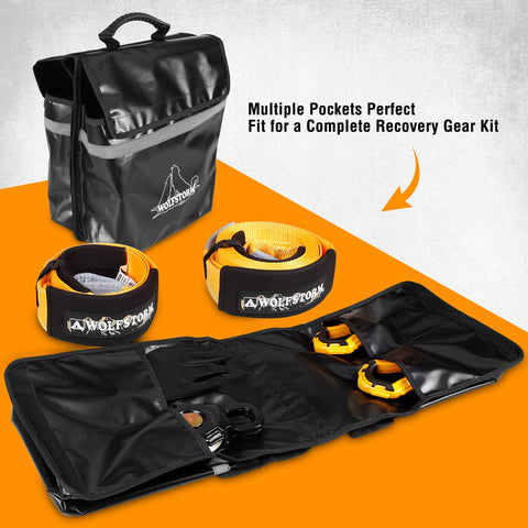 Beefy Off Road Winch Recovery Kit 8 Piece Set With 4x20 Tow Strap 4x8 Tree Saver 33000 Lbs Snatch Block Two Three Quarter Inch D Ring Shackles Recovery Gloves Winch Damper Storage Bag in black and orange storage bag with multiple pockets.