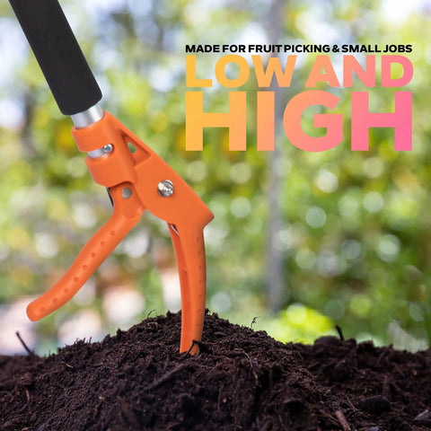 Long Reach Cut And Hold Bypass Pruner 3.5 Ft For Precision Pruning In Gardens with orange handle in garden soil
