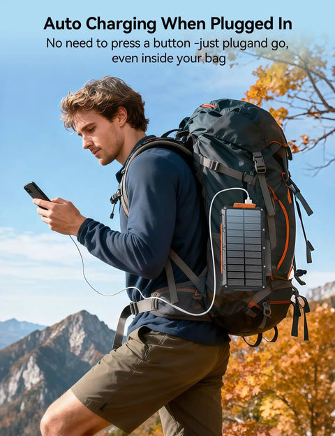 Man using On The Go Solar Power Bank 20000mAh With Built In Cables 20W Fast Charge Portable External Battery Pack while hiking