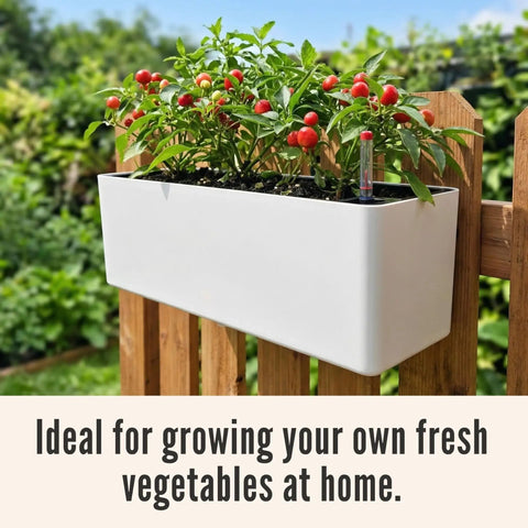 Total Patio Flex 16 Inch White Railing Planter Boxes 2 Pack Over Balcony Self Watering With Metal Brackets Plastic Window Boxes For Outdoor Herbs on wooden fence.