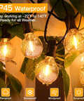 Weatherproof 50Ft Outdoor String Lights With 25 Edison Bulbs And 2 Spare LEDs, IP45 Waterproof And Shatterproof, glowing in rain