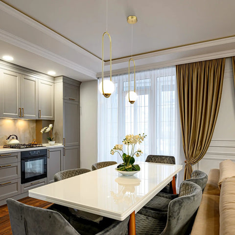 Integrated LED Pendant Light In Antique Brass With White Glass Shade over dining table