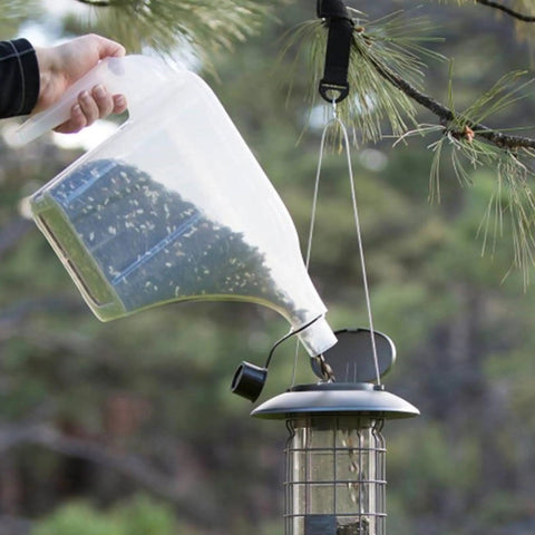 3N1 Bird Seed Super Tote And Storage For 5 Lb Capacity Carry Pour And Store Seed Easily With A Tapered Pour Spout in use