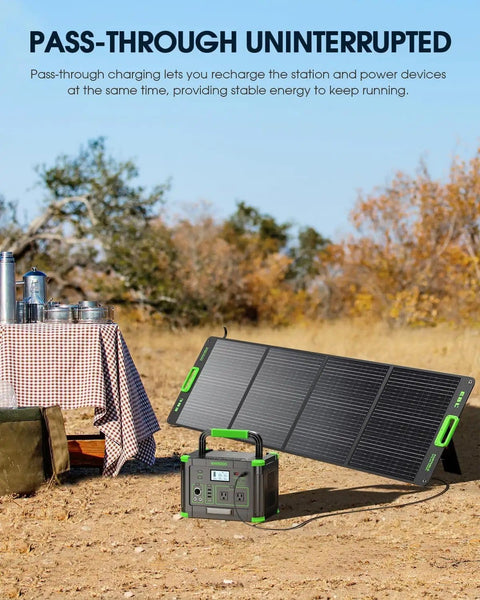Massive 999Wh Portable Power Station With 1000W Pure Sine Wave AC Output And 2000W Peak next to solar panel in outdoor setting