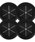 Black Rubber Grommet Kit For Cable Management With Dual Sided Buckle Design, Fire Resistant And Waterproof Desk Hole Cover For Office And Home Use, Includes Four Pieces. Four black rubber desk grommets shown front view.