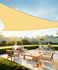 Beige Triangle Shade Sail 8x8x8 Feet Permeable Outdoor Sun Shade Cloth Made From HDPE With Reinforced Stitching And Stainless D Rings 95% UV Block Perfect For Deck Backyard Or Patio Custom Sizes Available installed over patio furniture