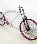 Purple 26 Inch Heavy Duty Bike Rim Wheel Set With Double Wall Aluminum Alloy 12 Gauge 48 Spokes on a bike frame.