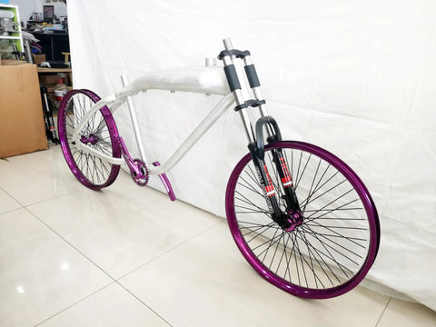 Purple 26 Inch Heavy Duty Bike Rim Wheel Set With Double Wall Aluminum Alloy 12 Gauge 48 Spokes on a bike frame.