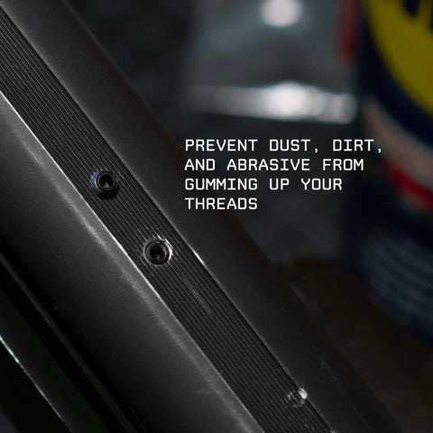 Gun Plug Screw Set For Rifle And Shotgun Receivers That Snaps Into Factory Optics Ports With A Dead Nuts Seal In Six Forty Eight And Eight Forty Zero Threads showing tight seal covering mounting taps.