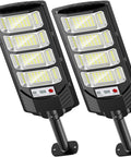 Built Tough Heavy Duty Solar Outdoor Flood Lights With Smart Motion Sensor And Dusk To Dawn Automatic Activation And Ultra Bright IP66 Waterproof Wireless Security Spotlights For Backyard Gate Driveway, two flood lights with multiple LEDs.