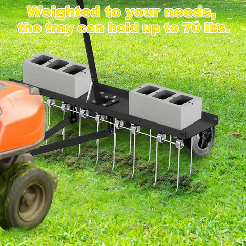 Tow Behind 40 Inch Dethatcher With 20 Spring Steel Tines For Large Lawns attached to a riding mower on grass