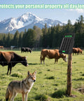 Go To Solar Fence Charger Energizer With 0.11J Output 5 Mile Range mounted on fence in pasture with cows and mountains