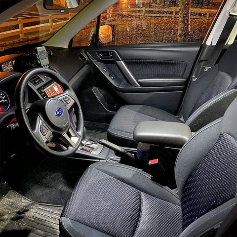 Subaru interior lit by 6000K bulbs from Lit White Interior LED Light Kit For WRX STI Impreza 2004 To 2022, showing dashboard and seats