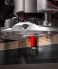 One Half Inch Bearing Flush Trim Router Bit With TiCo Hi Density Carbide for laminate work, shown installed in router.
