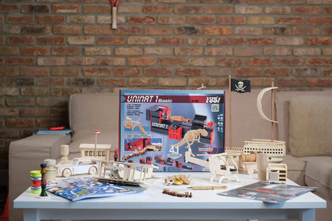 4-In-1 Woodworking Kit For Kids Ages 8 And Up Lathe Drill Sander And Saw STEM DIY Project Tool Set For Young Makers displayed on table