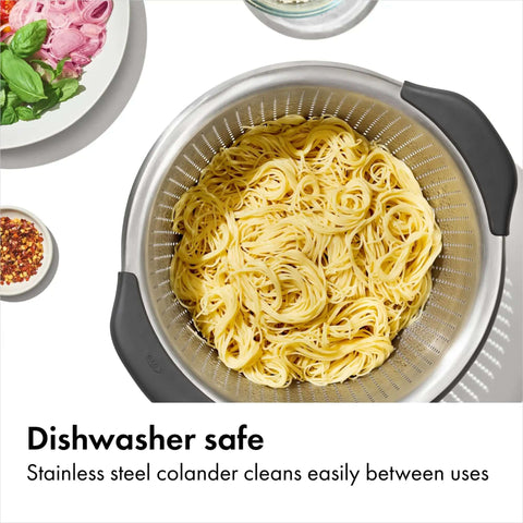 Non Slip Grip 5 Qt Stainless Steel Colander with Comfortable Handles, filled with pasta, showing durable nesting strainer for rinsing.