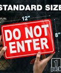 Dang Solid No Entry Warning Sign, 8X12 Inch Heavy Duty Reflective Aluminum Panel For Doors Gates Fences And Private Property, Pre Drilled For Quick Easy Setup displayed in hands.