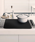 Heat Resistant Glass Stovetop Cover For Electric Stoves 21 By 29 Point 5 Inches Fireproof Waterproof Shield on kitchen counter with pot