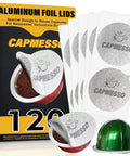 Aluminum Foil Lids For Reusable Nespresso Vertuoline Pods, Sticker Seals For A Quick No Fuss Seal That Fits All Pod Sizes, Works With Vertuoline GCA1, VertuoPlus, And Vertuoline Next, 120 Pack with coffee pod and sealed lids shown.