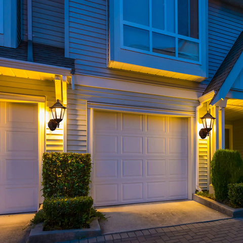 Motion Activated Outdoor Porch Light With Waterproof Exterior Sconce Featuring Motion Sensor No Fuss Easy Install Black Anti Rust Plastic LED Lamp For Front Door Garage Patio And House Exterior illuminating a white garage