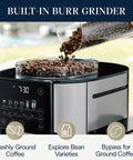 TrueBrew Drip Coffee Maker With Built-In Grinder And Bean Extract Technology, stainless steel, showing coffee beans in grinder.
