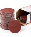 100 Pack 3 Inch 80 Grit Sanding Discs With Hook Loop Backing For Drills And Grinders, showing stack and open box.