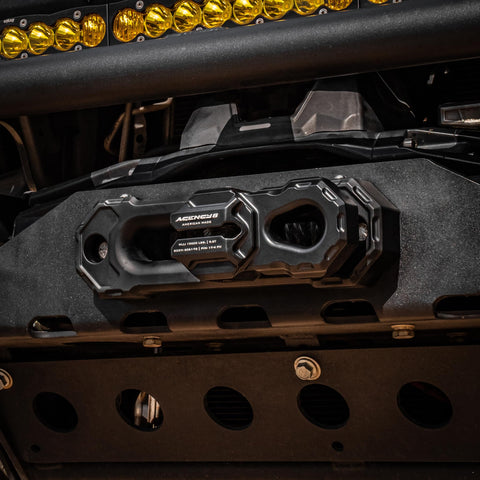 Black Billet Aluminum Winch Shackle attached to vehicle bumper, showing lightweight heavy-duty design, Made in USA