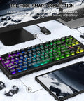 Top Shelf Wireless Mechanical Keyboard With Blazing 8k Polling Speed And A Rock Solid 10000Mah Cell Mounted On A Clever Dot Matrix Panel Plus Dope 168 Million Rgb Backlights For Your Pro Gamer Desk Rig on a snowy surface with devices.