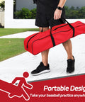 Person carrying a red bag with Portable Baseball And Softball Practice Net With Bow Frame Foldable Batting Cage for drills.
