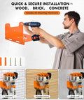 Man installing Heavy Duty Weed Eater And Hedge Trimmer Wall Mount Rack For Garage And Shed Tool Organizer Orange With Reinforced 2mm Steel And Triangle Support Heavy Duty Design Wide 2 Inch Center Slot For Trimmers Shovels And Rakes on wall