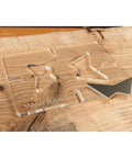Straight Up Butterfly Router Inlay Template Machined From Thick Clear Acrylic on wooden surface with metal guide.