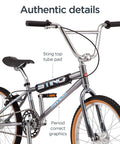 Sting Pro Retro BMX Bike with single speed drivetrain, hi-ten steel frame, aluminum rims, and 20 inch wheels in smoke chrome finish.