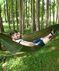 Outdoor Camping Hammock With Mosquito Net And Bug Net Dope 13 Foot Parachute Nylon Hammock With Tree Straps And Carabiners in use