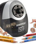 Heavy Duty 6 Hole Pencil Sharpener With Industrial Motor Quiet Fan Cooled Operation next to sharpened colored and graphite pencils.