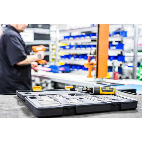 Go-To Quarter Inch Drive Torque Screwdriver With Locking Collar on workbench in workshop setting