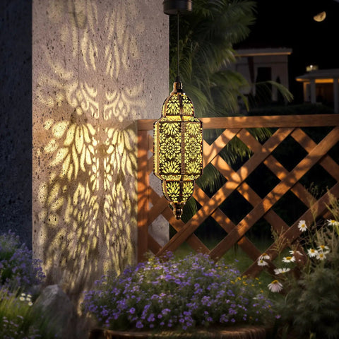 Outdoor Hanging Solar Lantern Lights No Wiring Needed, Waterproof Metal Moroccan Style Garden Decor For Patio Pathway Yard Porch Backyard Gold Finish, casting warm patterns on a wall.