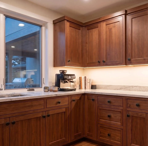 Kitchen with wooden cabinets fitted with Flat Black Mushroom Cabinet Knobs Set Of 25 For Kitchen And Cabinets, Matte Round Drawer Knobs.