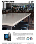 Top Tier Concrete Countertop Sealer Boasting Smooth Matte Finish on polished concrete bar top with stools in background.