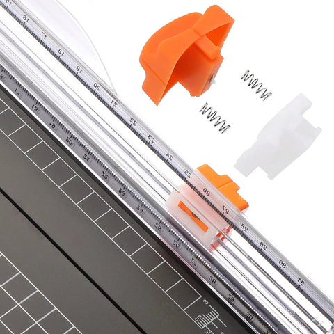 12 Inch Titanium A4 Paper Cutter With Automatic Safety Guard And Side Ruler, springs and parts visible