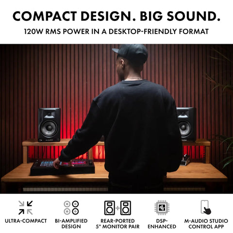 Person using BX5BT 5 Inch Desktop Studio Monitor Speakers With DSP And Bluetooth App Control, 240W Bi-Amped Power in home studio
