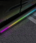 Plug And Play Deployable Running Boards For Tesla Cybertruck with customizable LED strip lights installed along the side.