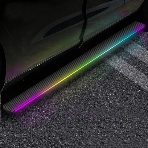 Plug And Play Deployable Running Boards For Tesla Cybertruck with customizable LED strip lights installed along the side.