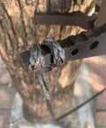 Daisy Chain Climbing Aider For Hunting, Lightweight One And A Half Foot Rope Ladder Step, looped over metal step on a tree.
