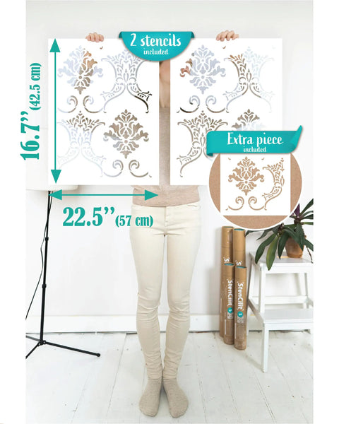 Person holding Baroque Damask Wall Stencil Kit For Painting 2-Pack Large 16.5 By 21.5 Inch Stencils Victorian Style Wall Decor DIY