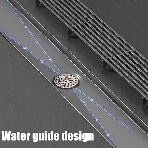 Sleek Linear Shower Drain With Locking Grate Cover For No Sweat Bathroom Floor Drainage And Anti Clog Hair Strainer Mesh Filter Effortless Cleanup Setup showcasing water guide design.