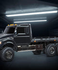 Beast 1-Tenth Scale 6WD RC Hauler With Pro Scale Winch, Ready-To-Drive Electric Flatbed Truck in dark garage
