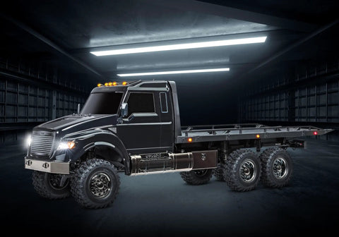 Beast 1-Tenth Scale 6WD RC Hauler With Pro Scale Winch, Ready-To-Drive Electric Flatbed Truck in dark garage