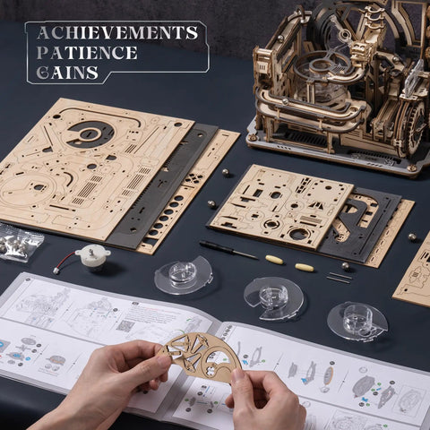 Person assembling the Dope 3D Puzzle Marble Run Kit For Adults Electric Spaceport LGC01 with 472 wooden pieces, instructions visible.